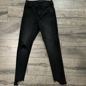 Flying monkey, black, distressed denim jeans.